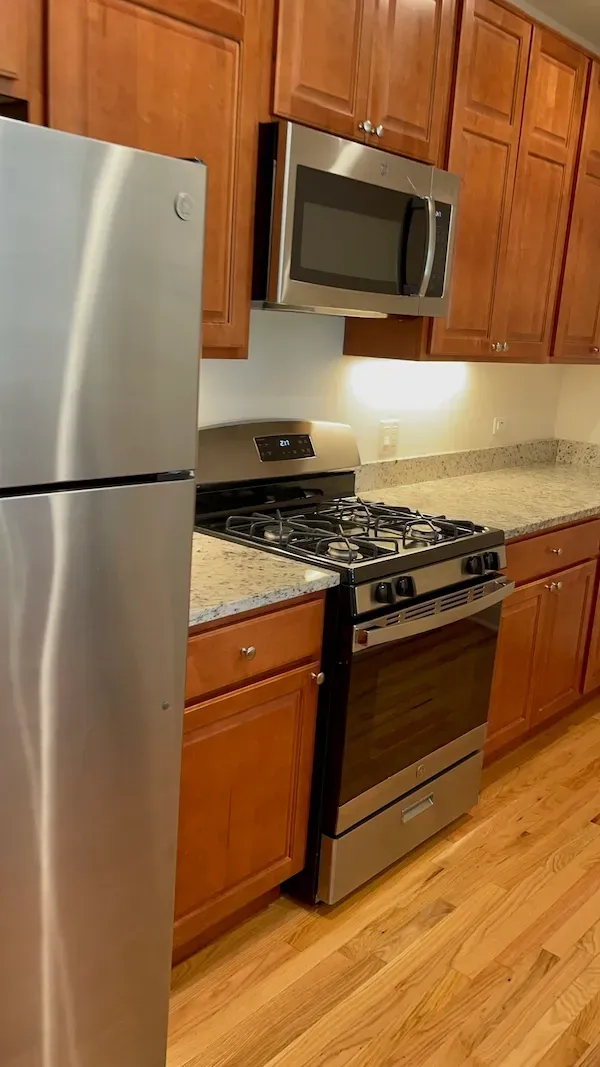 Standard kitchen cleaning with wiped countertops, clean sink, and tidy surfaces by Rux Cleaning.