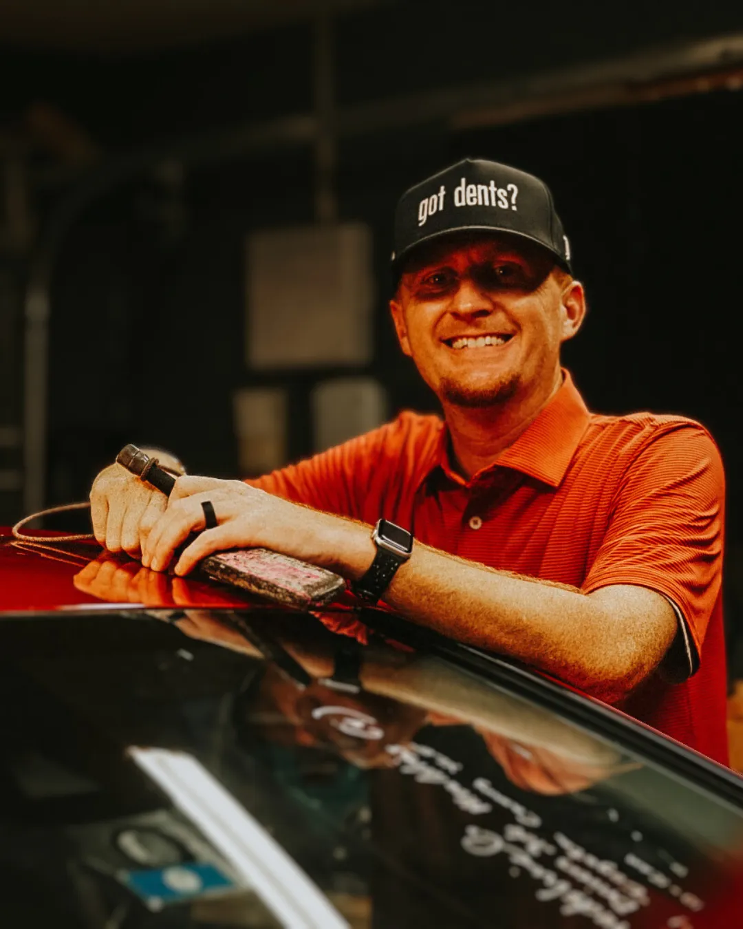 tefan from All-Pro Dent Co performing professional PDR on a car fender.