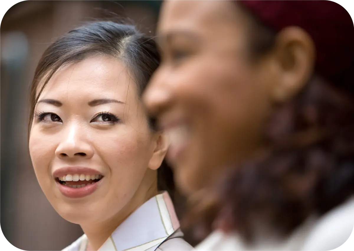 An advocate from PeaceWorks Inc talks to a victim of domestic violence