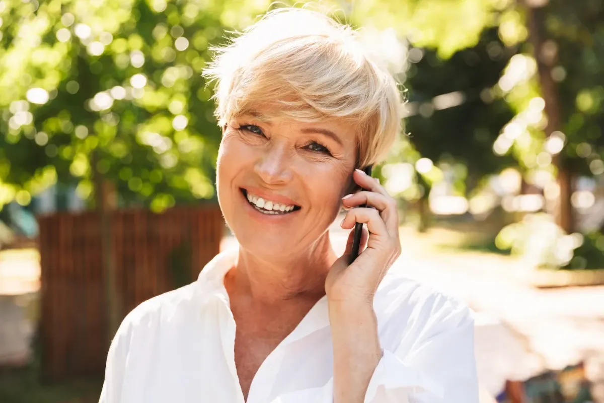 Sophisticated senior woman smiling, representing secure retirement and strategic Medicare planning in the Mountain West – Legacy Insurance & Financial Services.