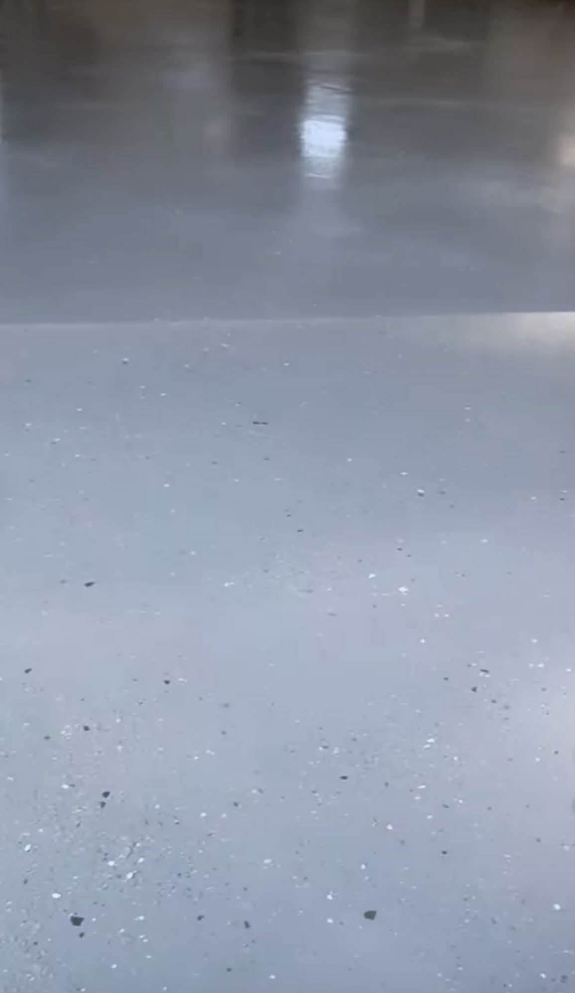 grey epoxy floor with partial flakes