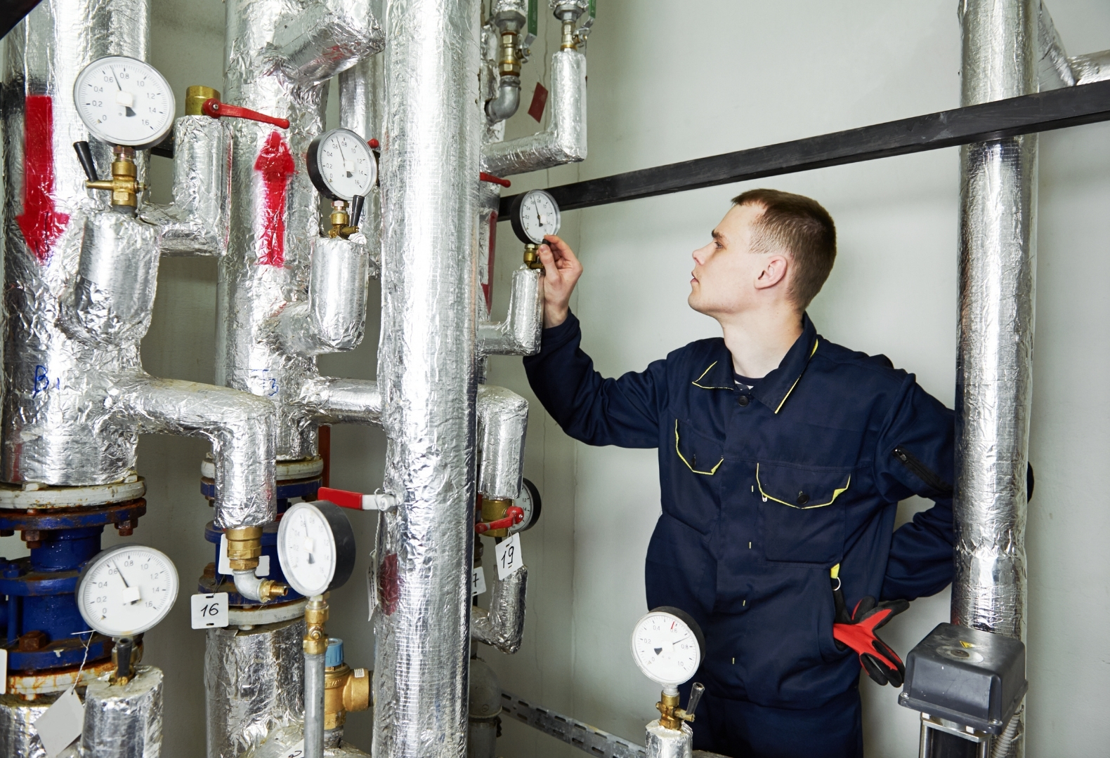 Mechanic performing boiler inspection readiness