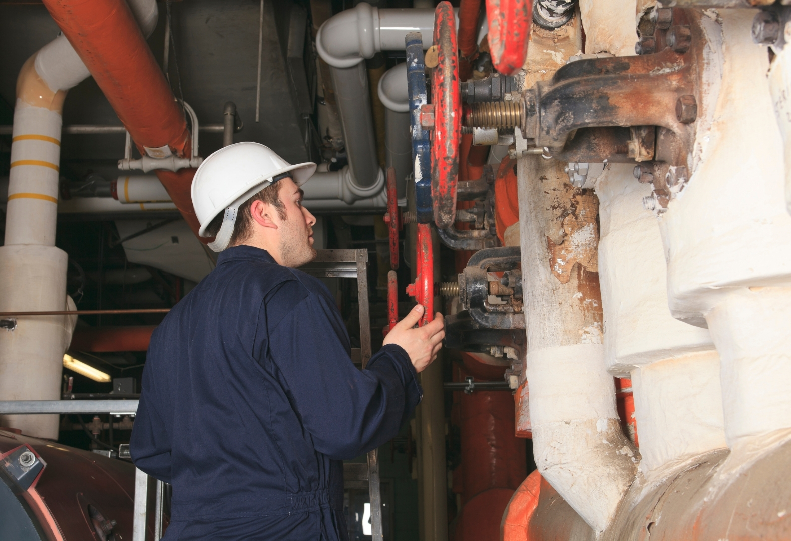 Mechanic in boiler inspection