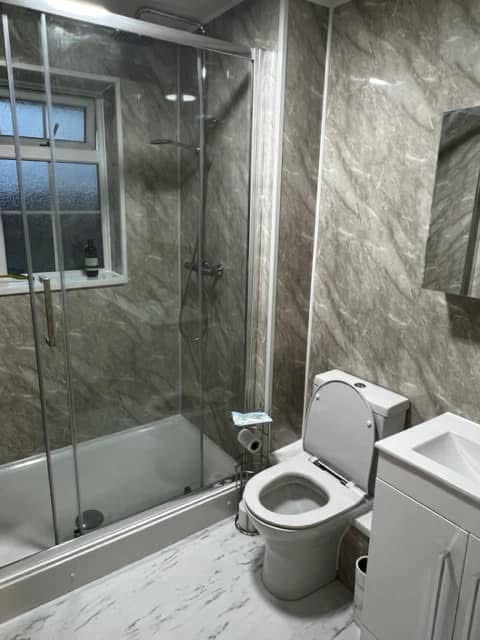 Emergency plumber installing a new bathroom for a local customer.