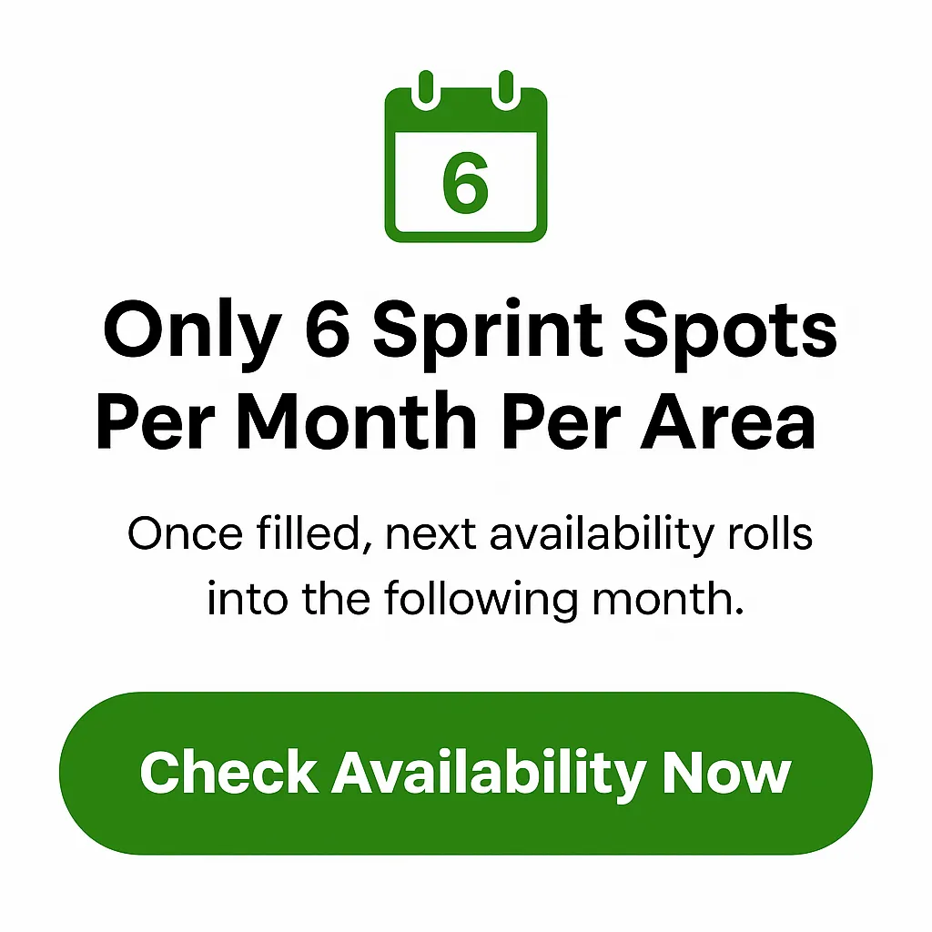 a white room with wood flooring and a large window