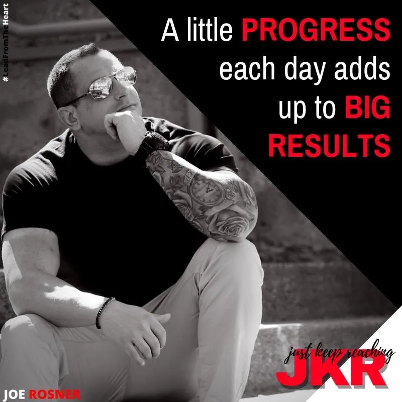 Mid-shot portrait of Joe outdoors, confident stance, desaturated tones.