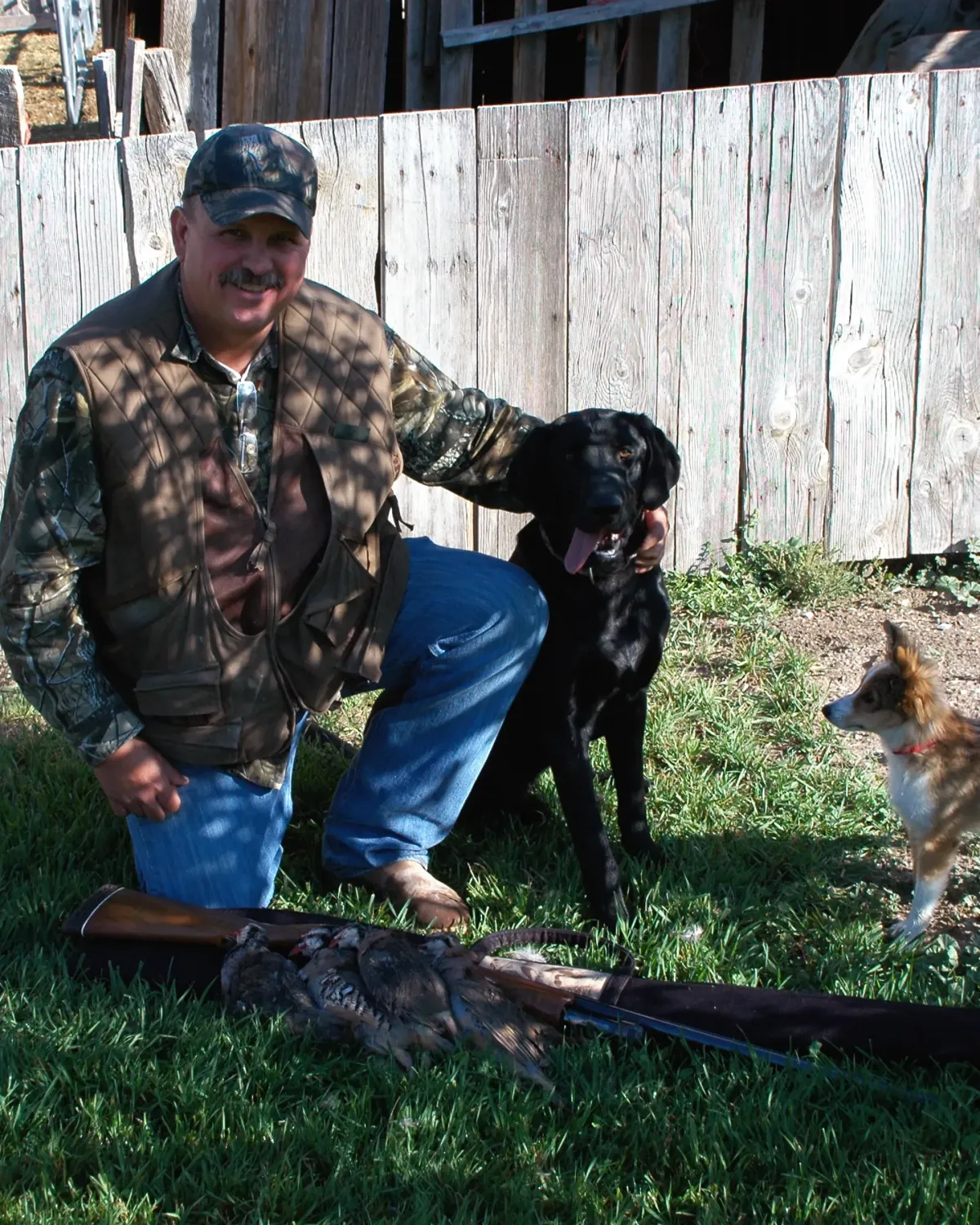 black lab with owner Troy Mitchell