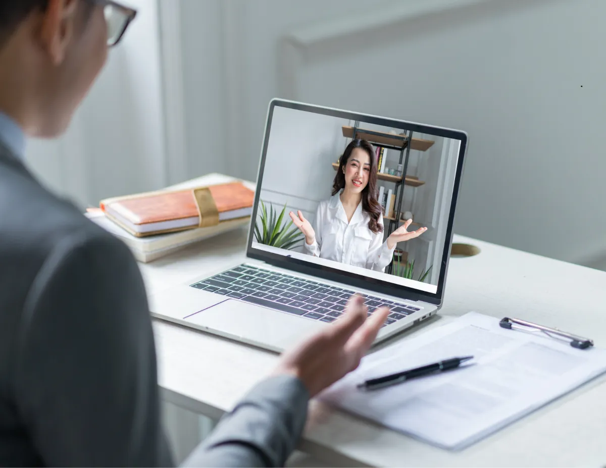 Business leader conducting a remote interview to hire top talent and build a high-performing virtual team.