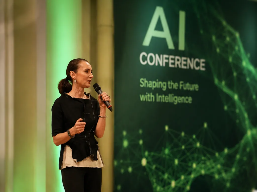 Jeanette Okwu delivering an AI keynote at an industry event