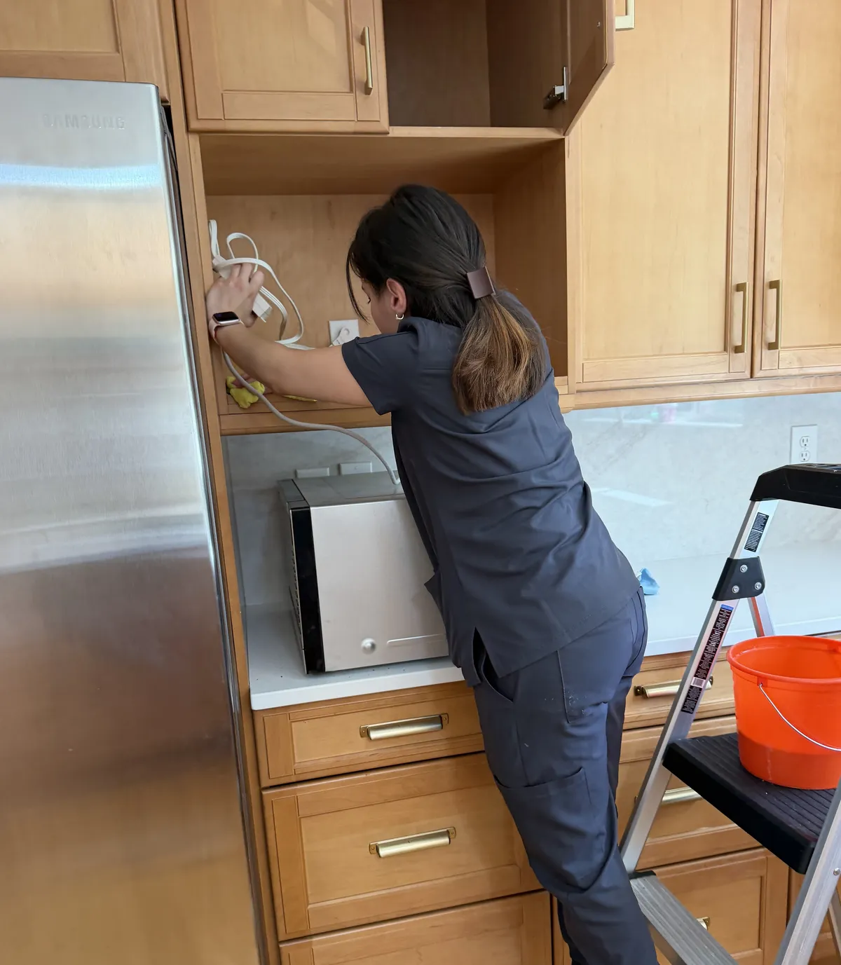 Feet sticking out of a moving box during cleaning