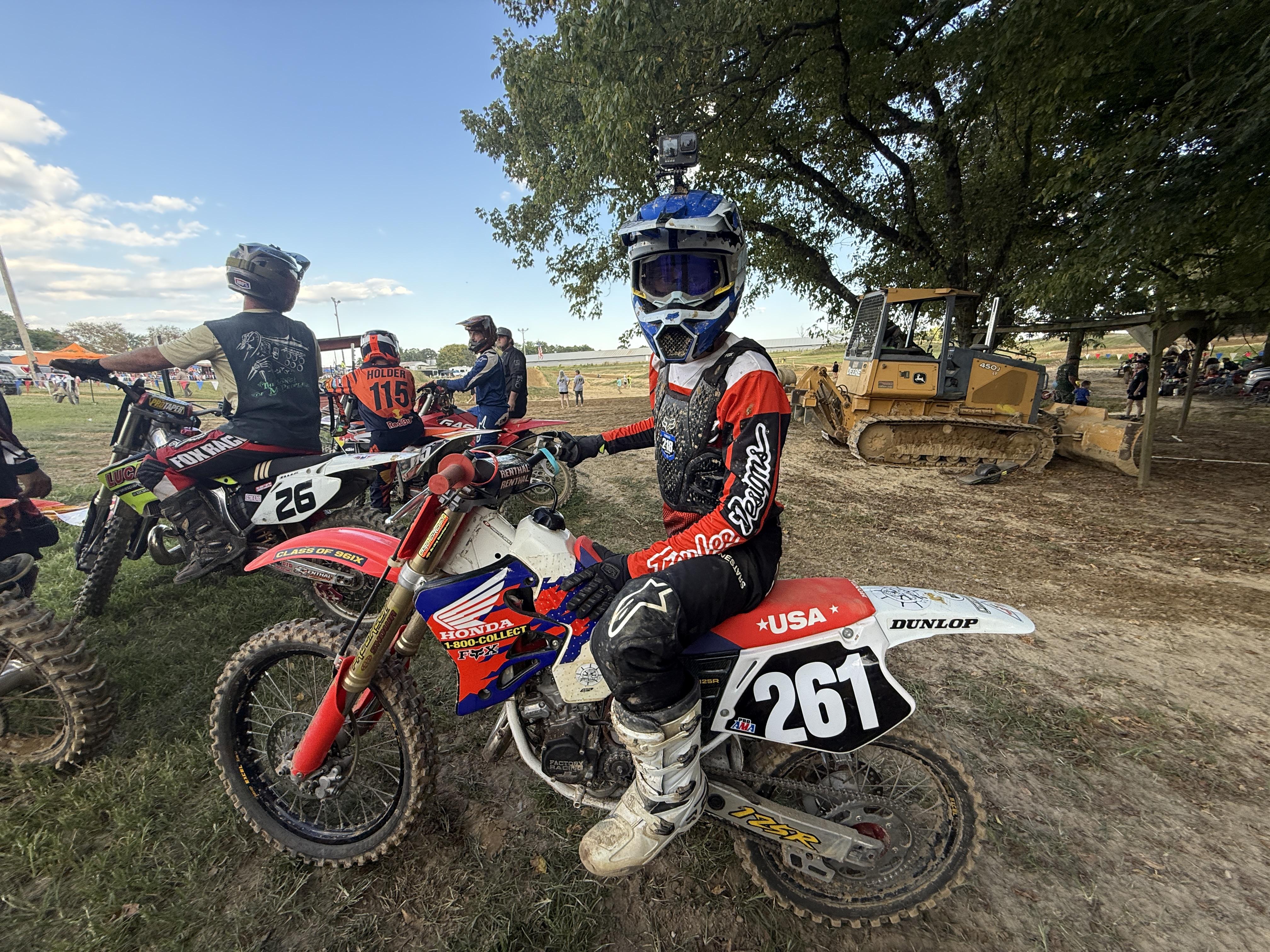 Harper218 race car taking a high-speed corner