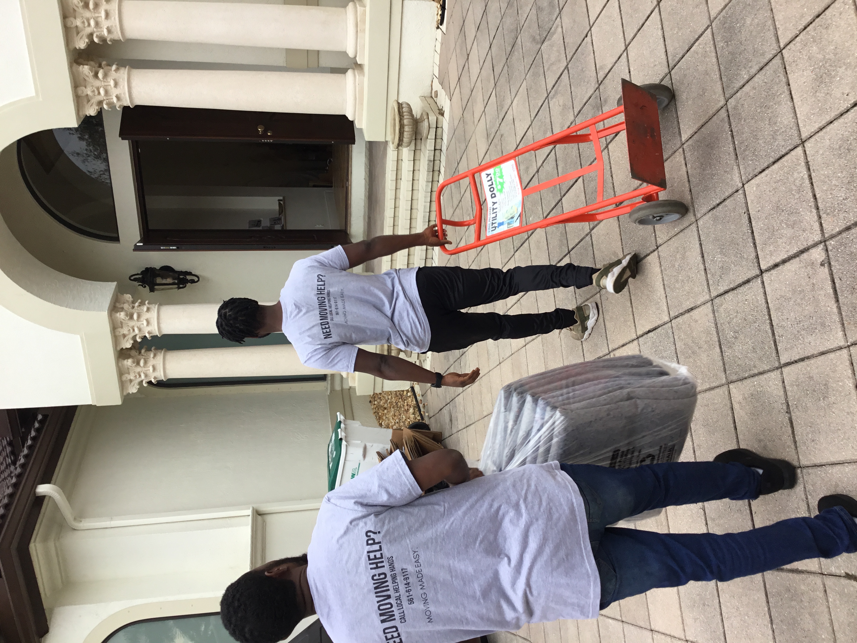 Group of people praying around a woman