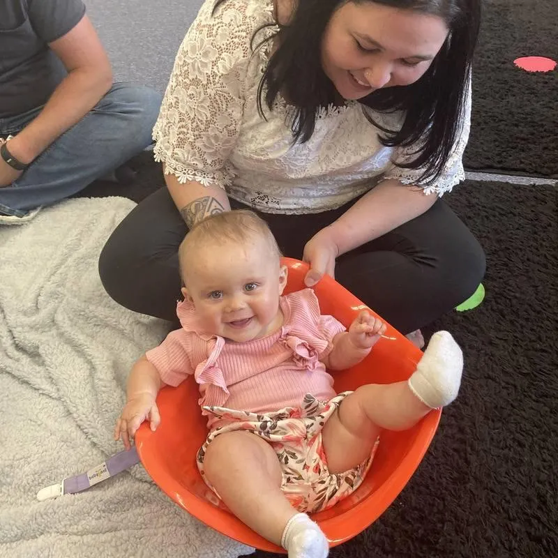 selective focus silhouette photography of man playing red-lighted DJ terminal