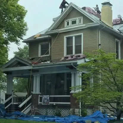 a roofer working in progress
