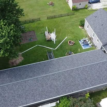 Riverside Restoration's commercial roofing services, featuring durable flat roofing options and expert installation.
