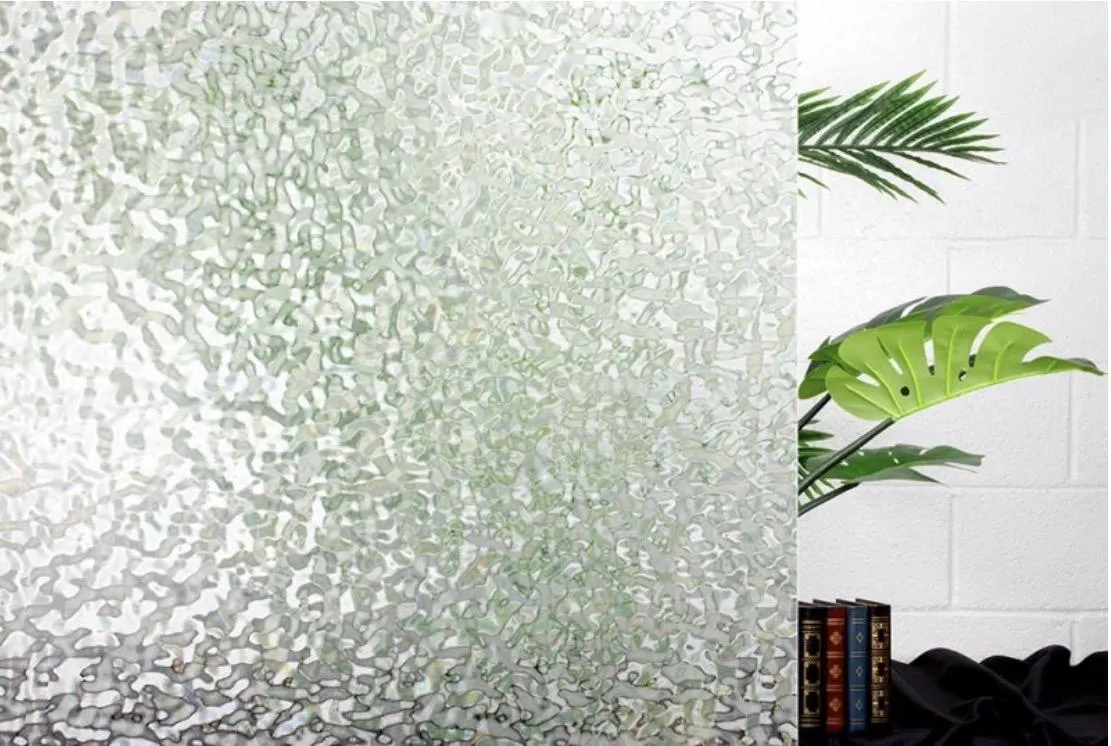 Decorative window film installed on office glass partition with custom etched design