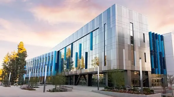 Commercial window film installation on office building exterior