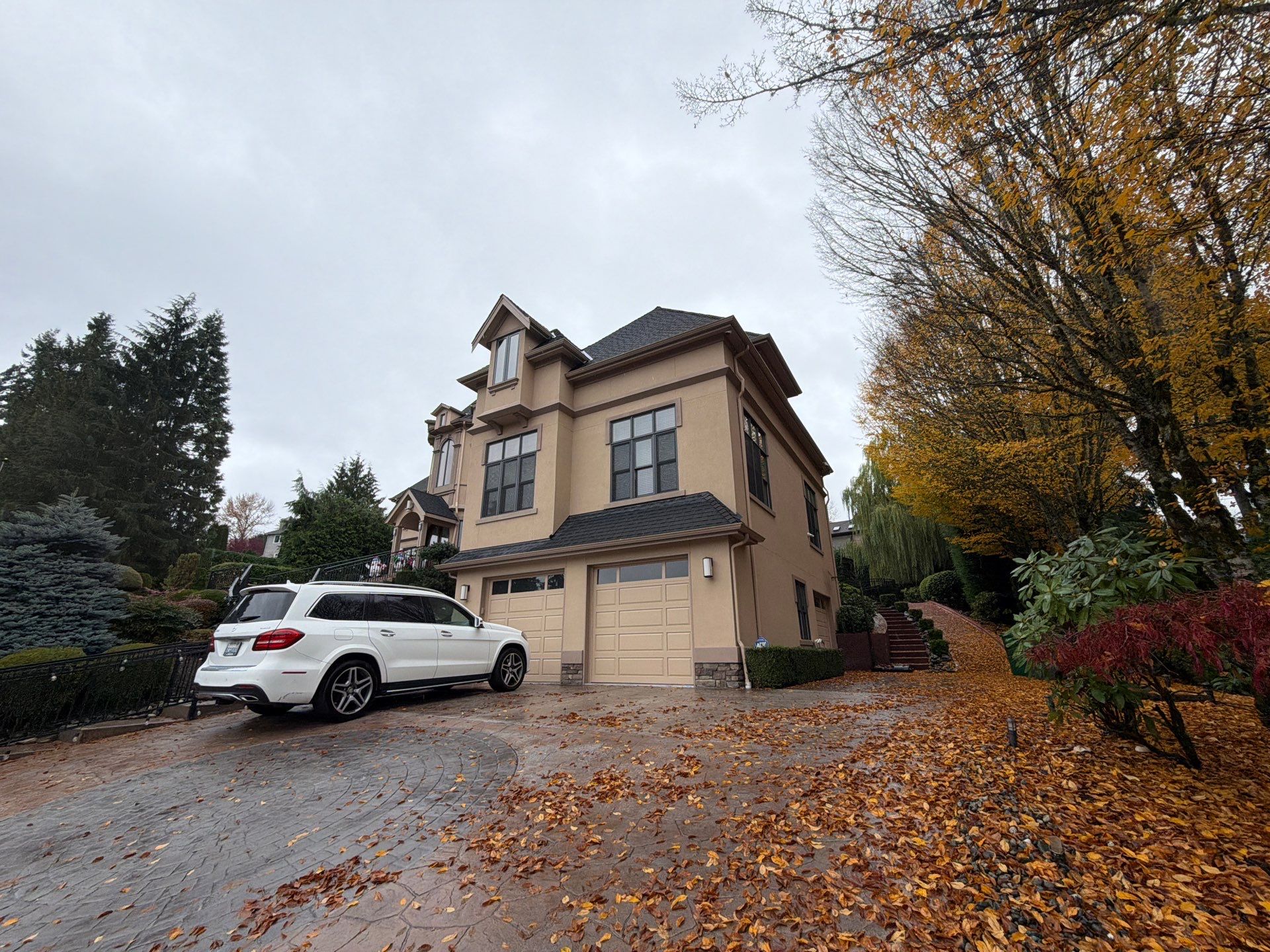 Roofing professionals conducting roof cleaning service