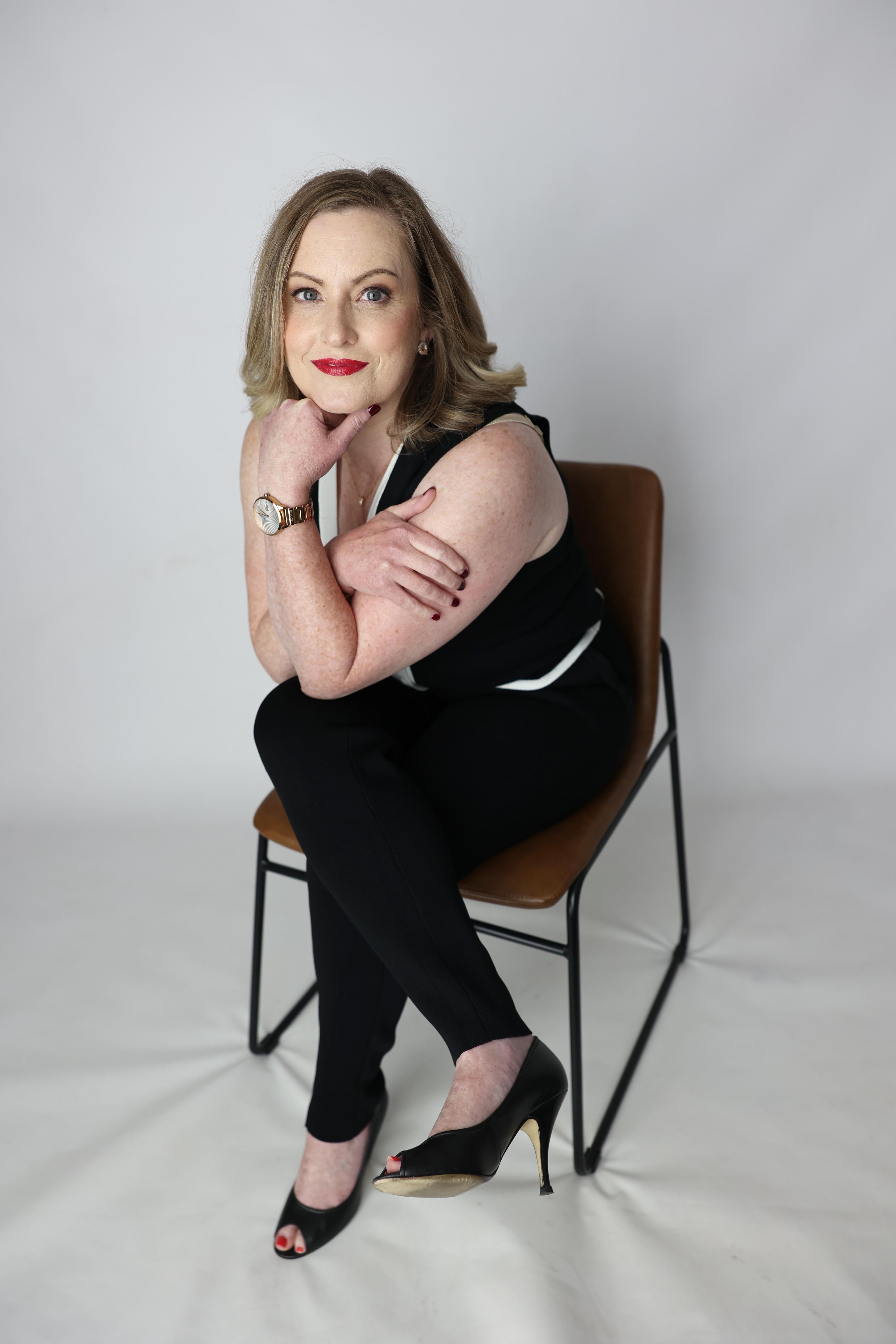 Andrea, Founder of Villers Finance Group, in a professional setting