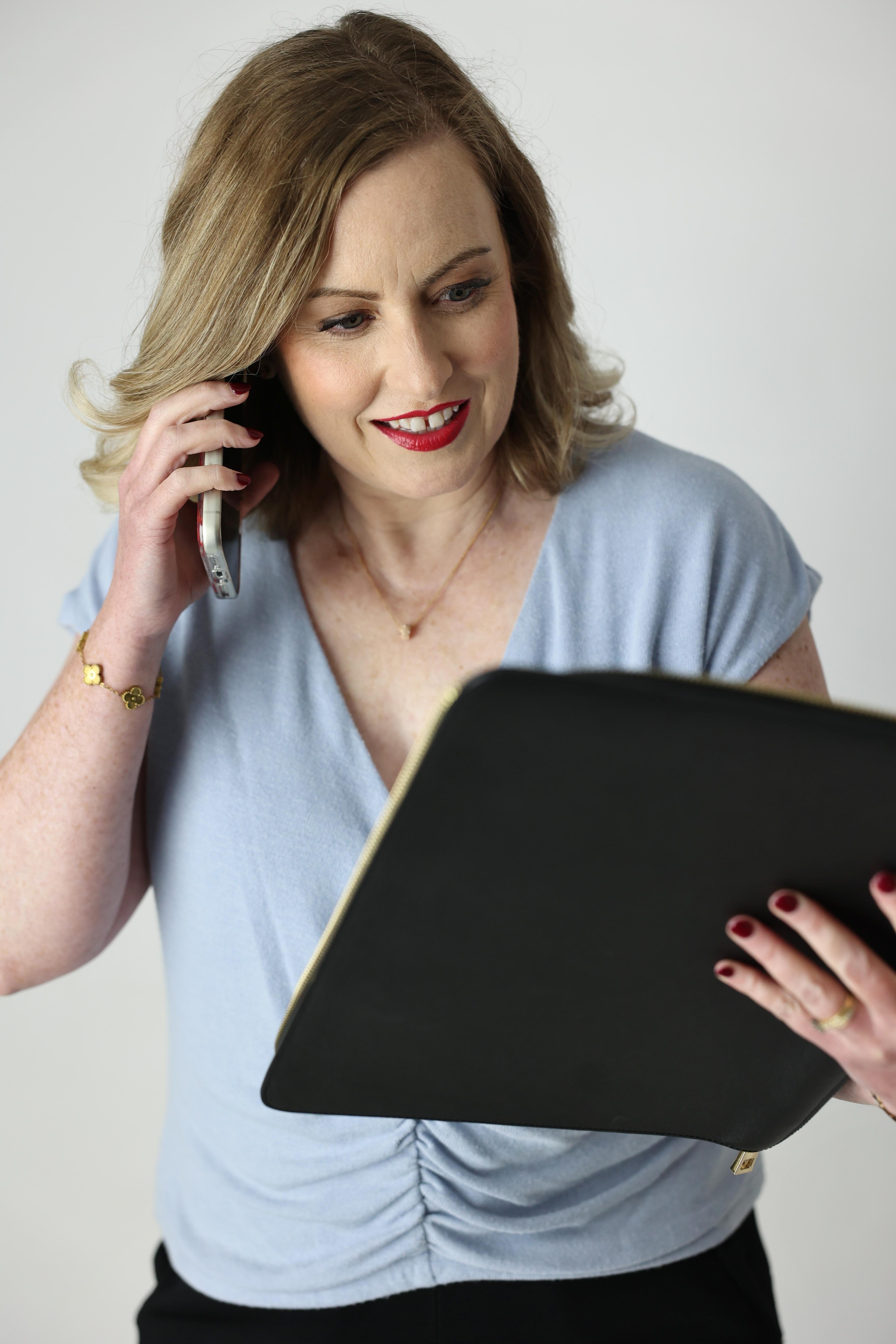 A laptop or notepad in a bright, feminine aesthetic representing plain-English guidance
