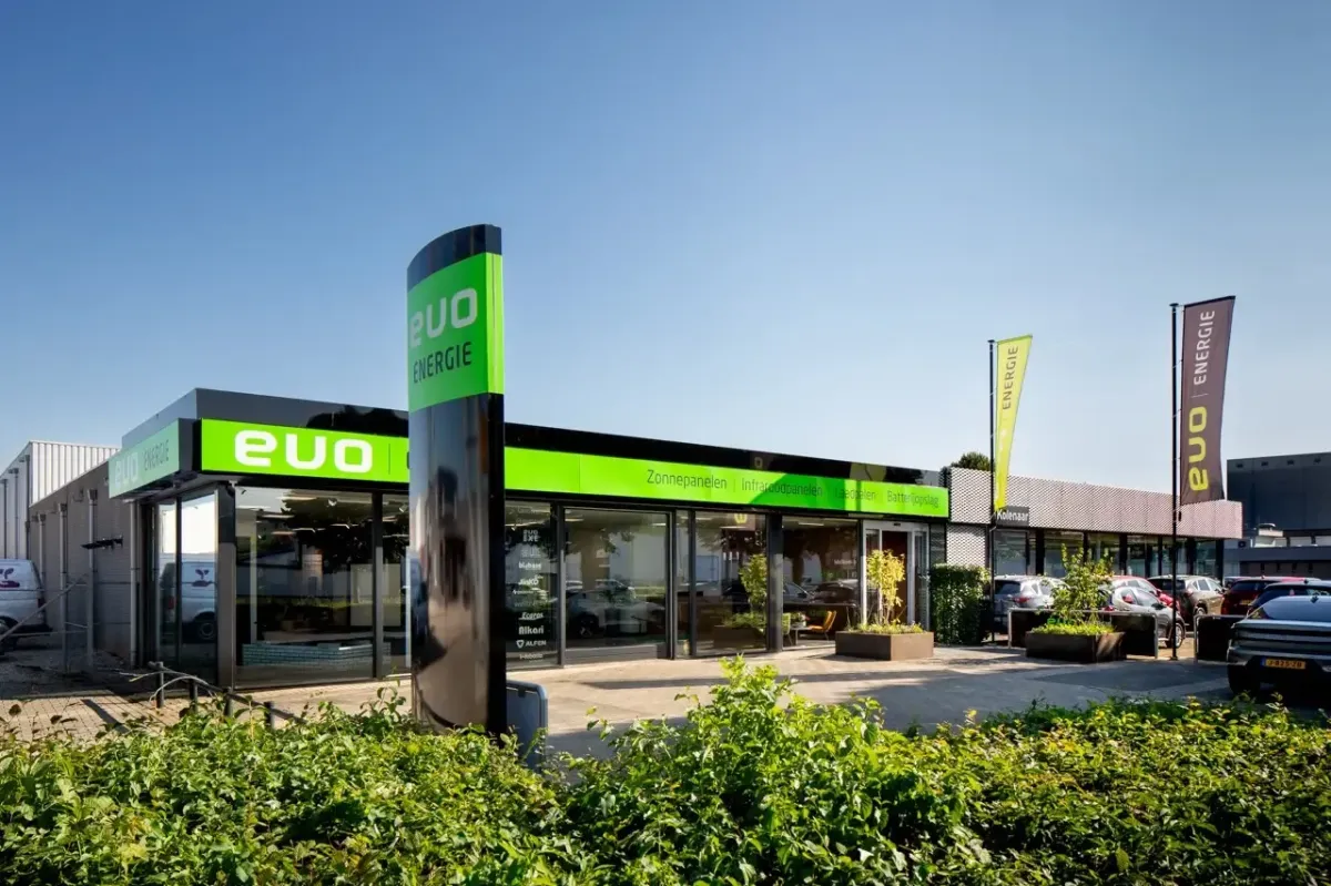 black solar panels on purple flower field during daytime