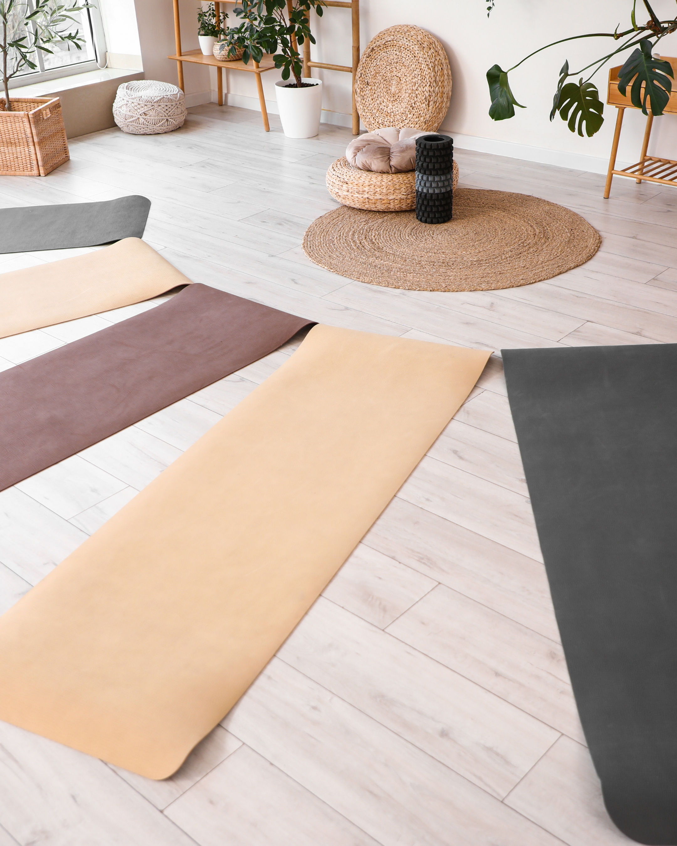 Yoga mats laid out or a breathwork circle
