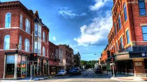 Street-level view of Dubuque’s Historic Millwork District with red-brick buildings