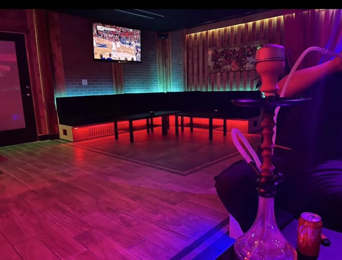 Interior of Sky Cafe & Lounge in Las Vegas with neon lights and hookah.
