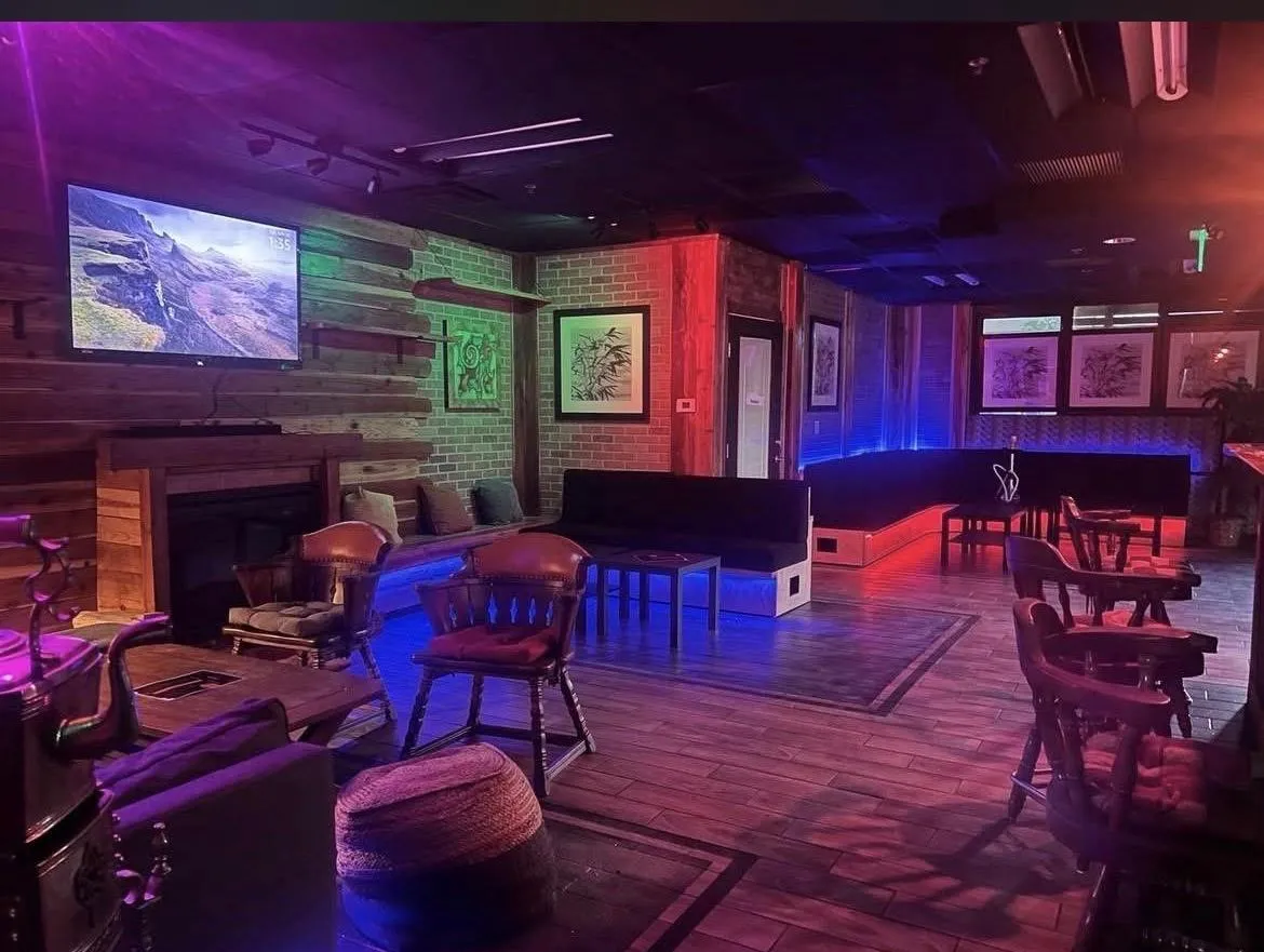 Ambient lighting and hookah setup at Sky Cafe & Lounge.