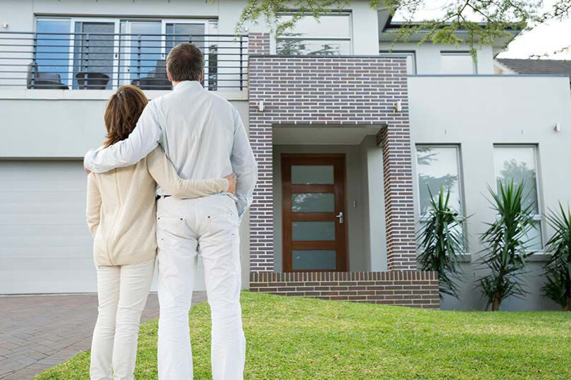 What is a holding trust in an SMSF property purchase?