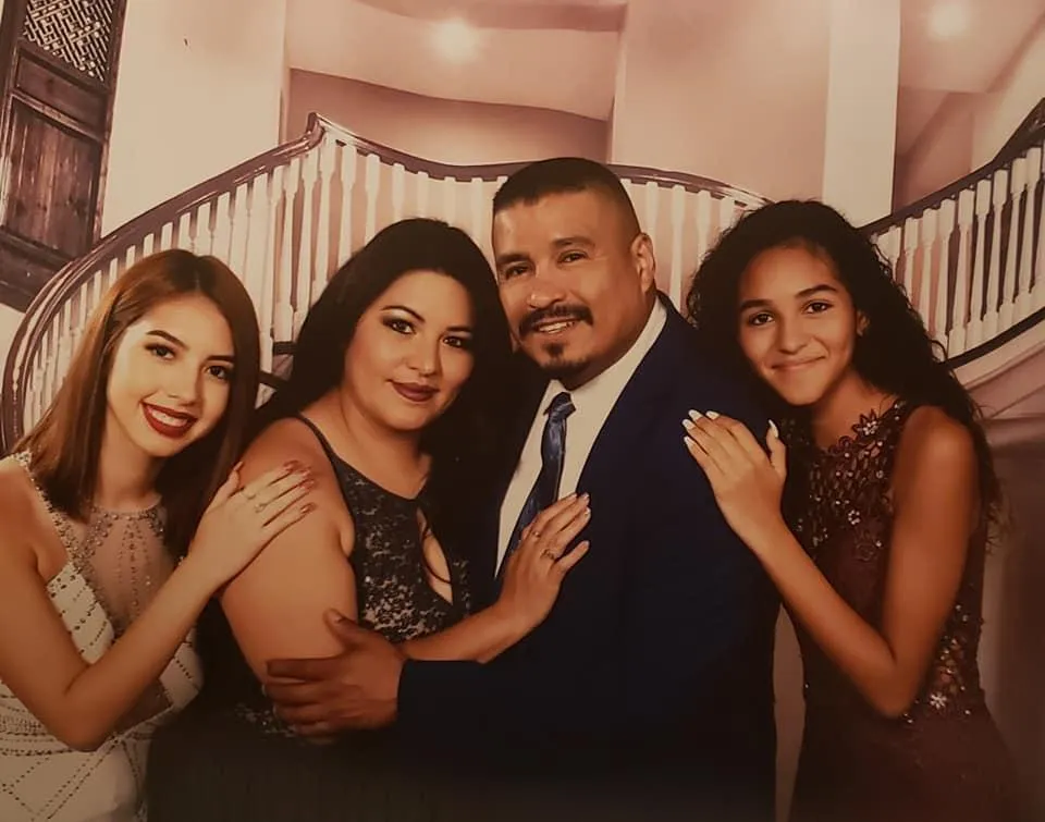 Cristina Mejía with her husband and two daughters, both of whom had their quinceañeras choreographed by Micah