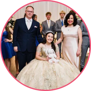 Mia Sheets with her parents during her quinceañera presentation in Louisiana, smiling together