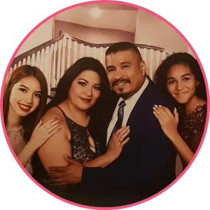Cristina Mejía with her husband and two daughters, both of whom had their quinceañeras choreographed by Micah