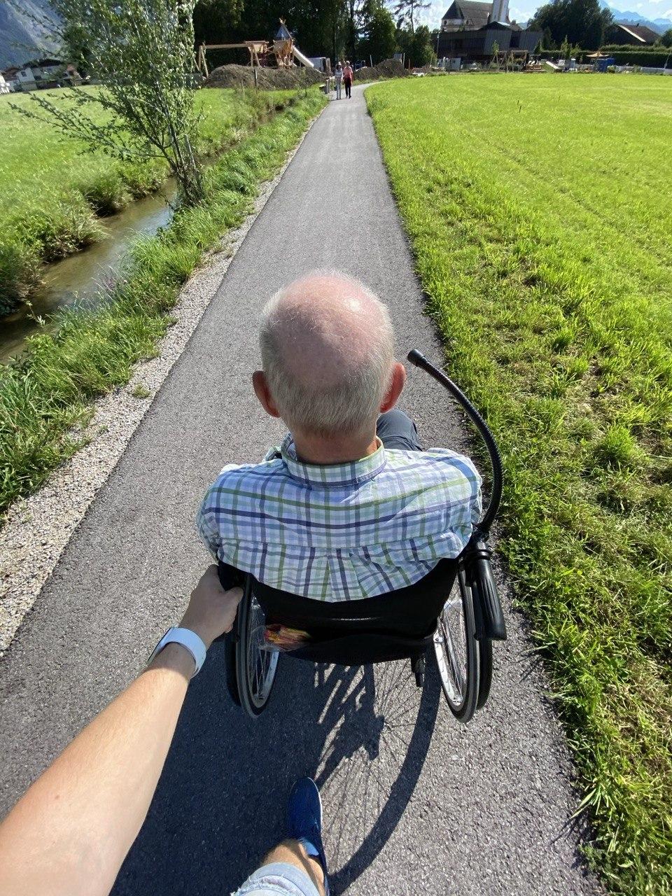 standing and sitting of people taking group photo