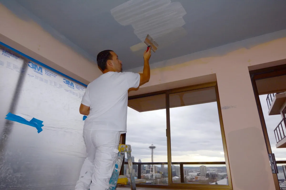 AMG Construction & Landscaping professional painting interior ceiling for a residential project in Kearns, Utah