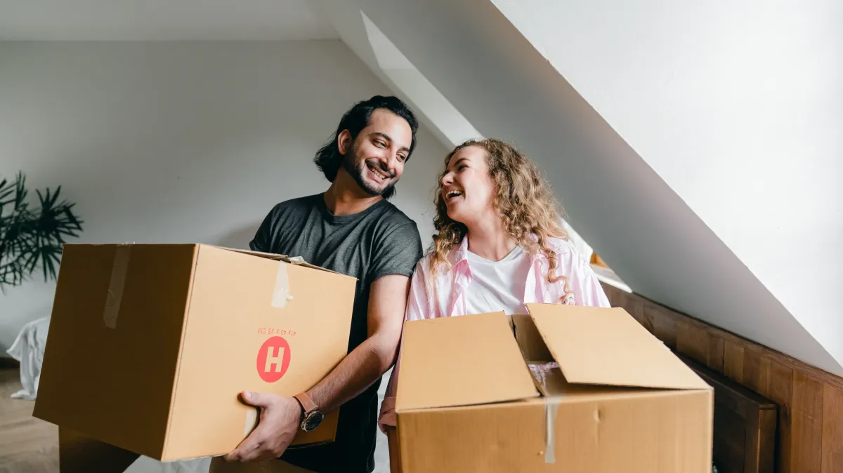 senior people packing moving box for local move