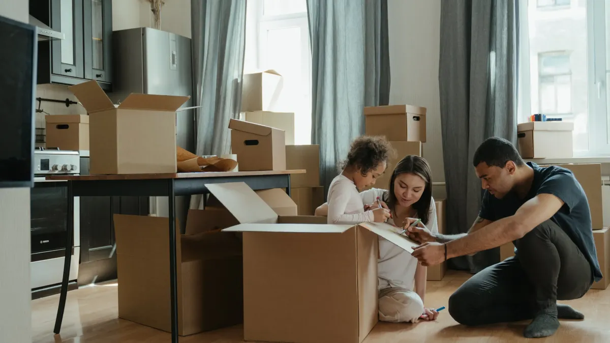 senior people packing moving box for local move