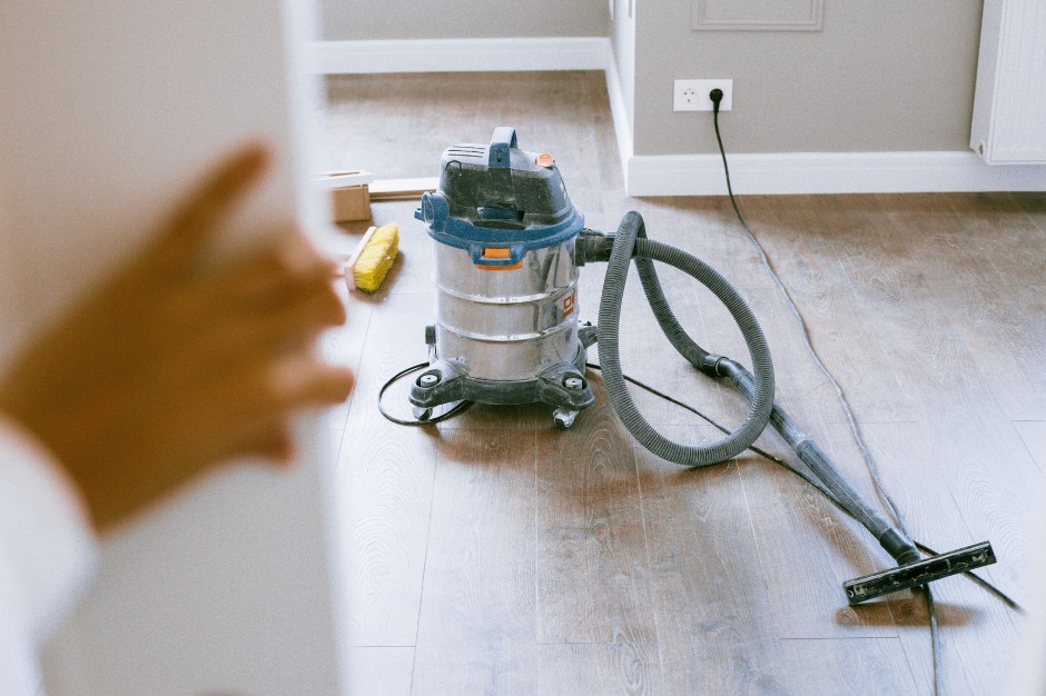 Post-construction cleaning crew working on finished interior space