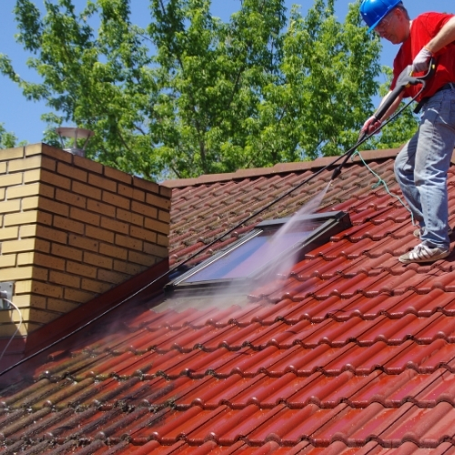Professional roof washing in Miramar, FL, using safe soft wash methods 