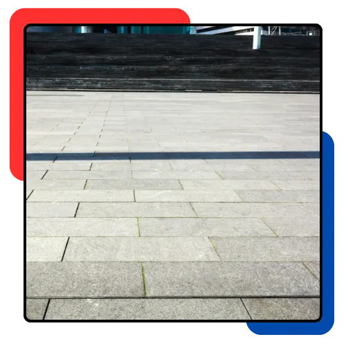 Bright concrete driveway cleaned by a local washing team