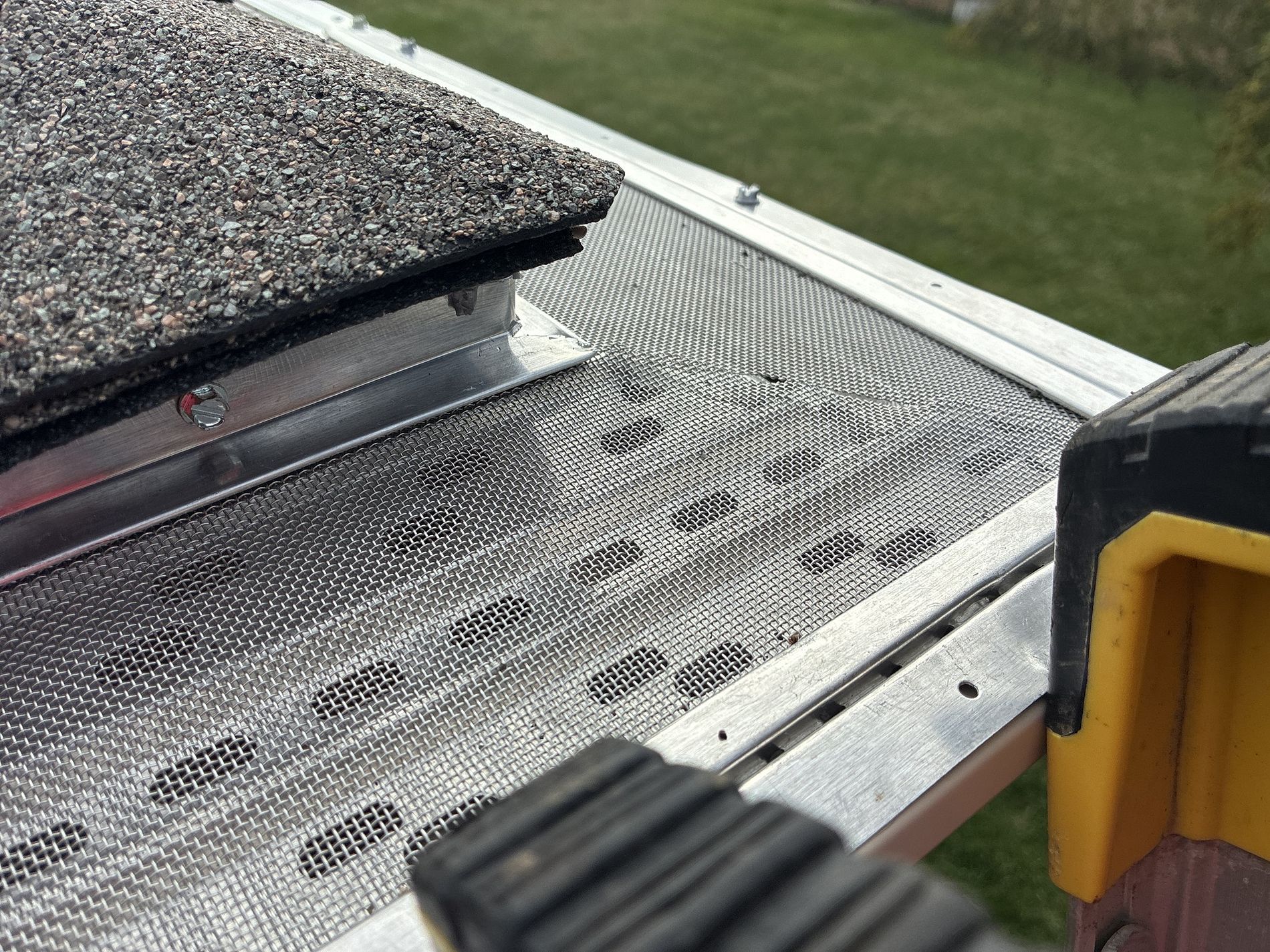 Roof edge and gutter system detail installed by Twin Bridge Roofing & Construction