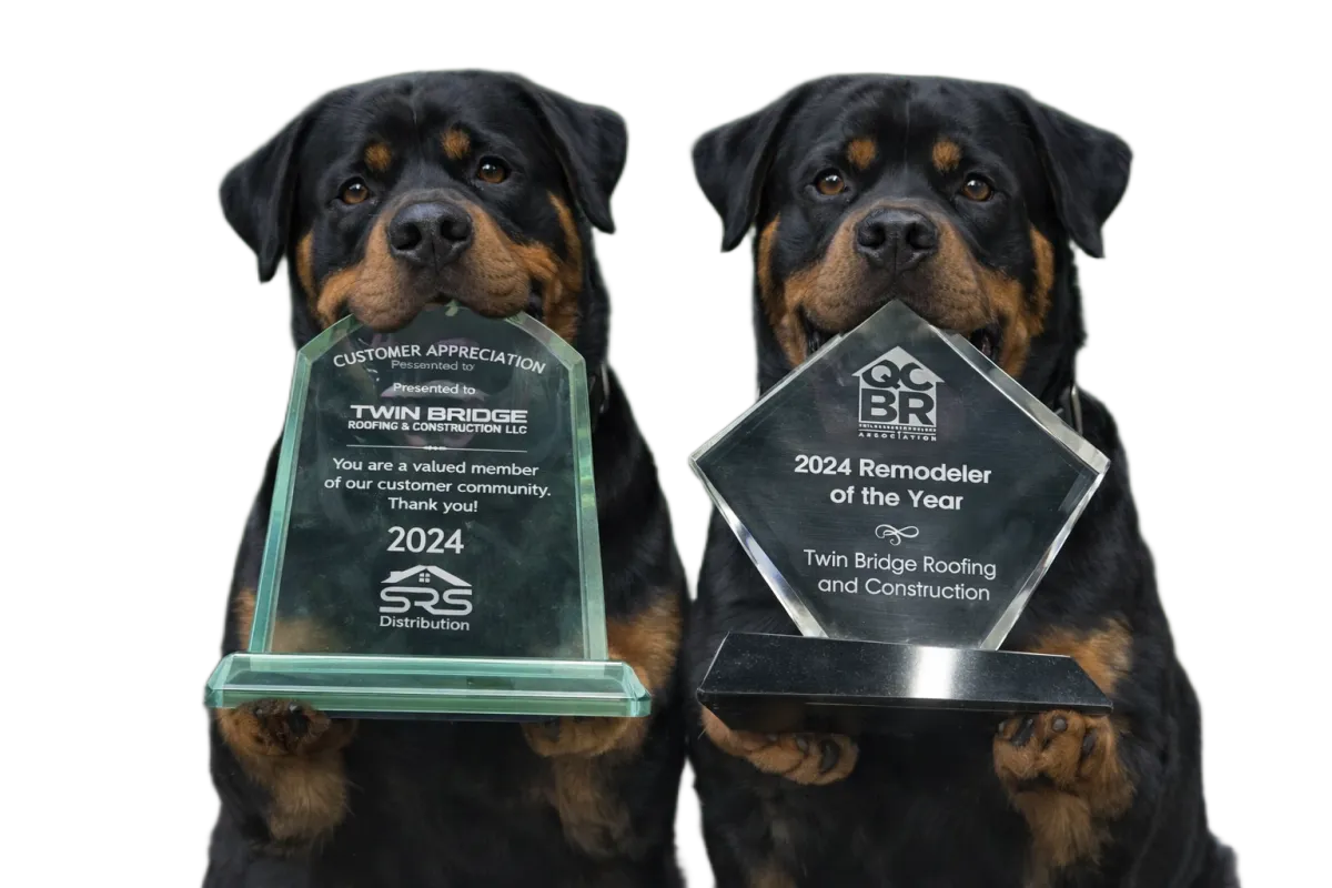 Twin Bridge Roofing & Construction awards featuring Storm and Titan holding 2024 Remodeler of the Year and customer appreciation plaques