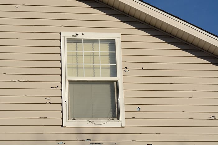Hail damage on a residential roof in the Quad Cities