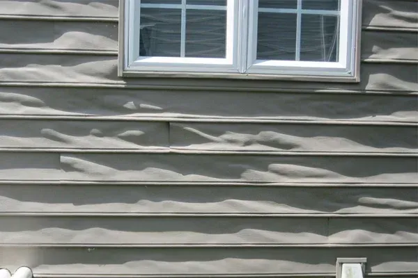 Close-up of vinyl siding on a Clinton, Iowa home near the Mississippi River