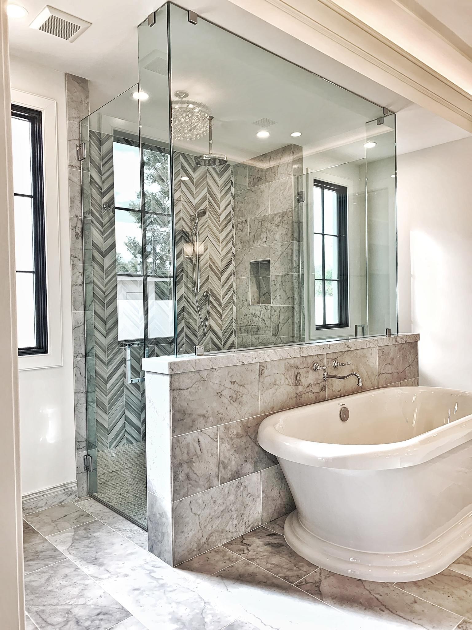 oversized frameless shower enclosure with clamps