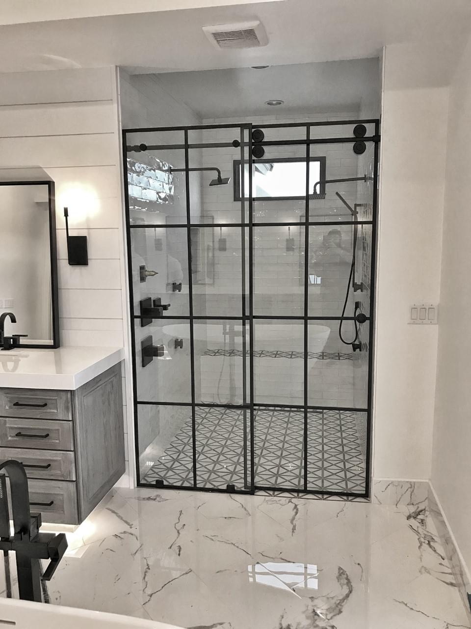 Custom grid barn door sliding glass shower doors