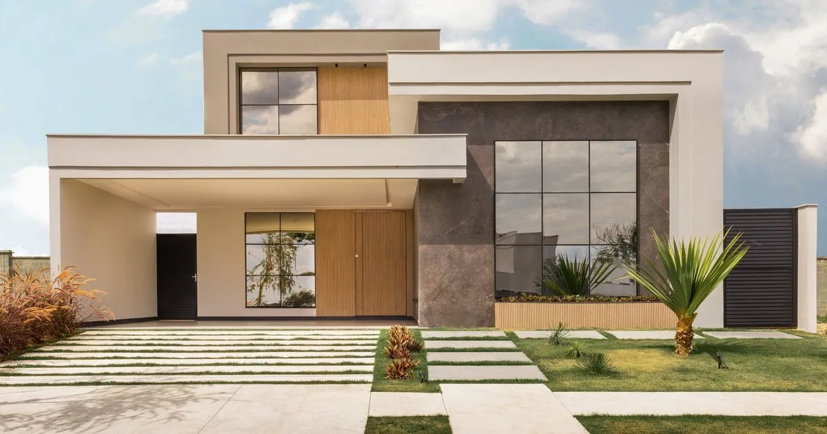 Modern single-story home with a covered carport and a landscaped front walk