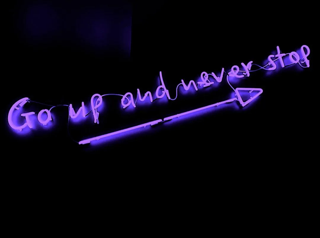 black background with purple text overal