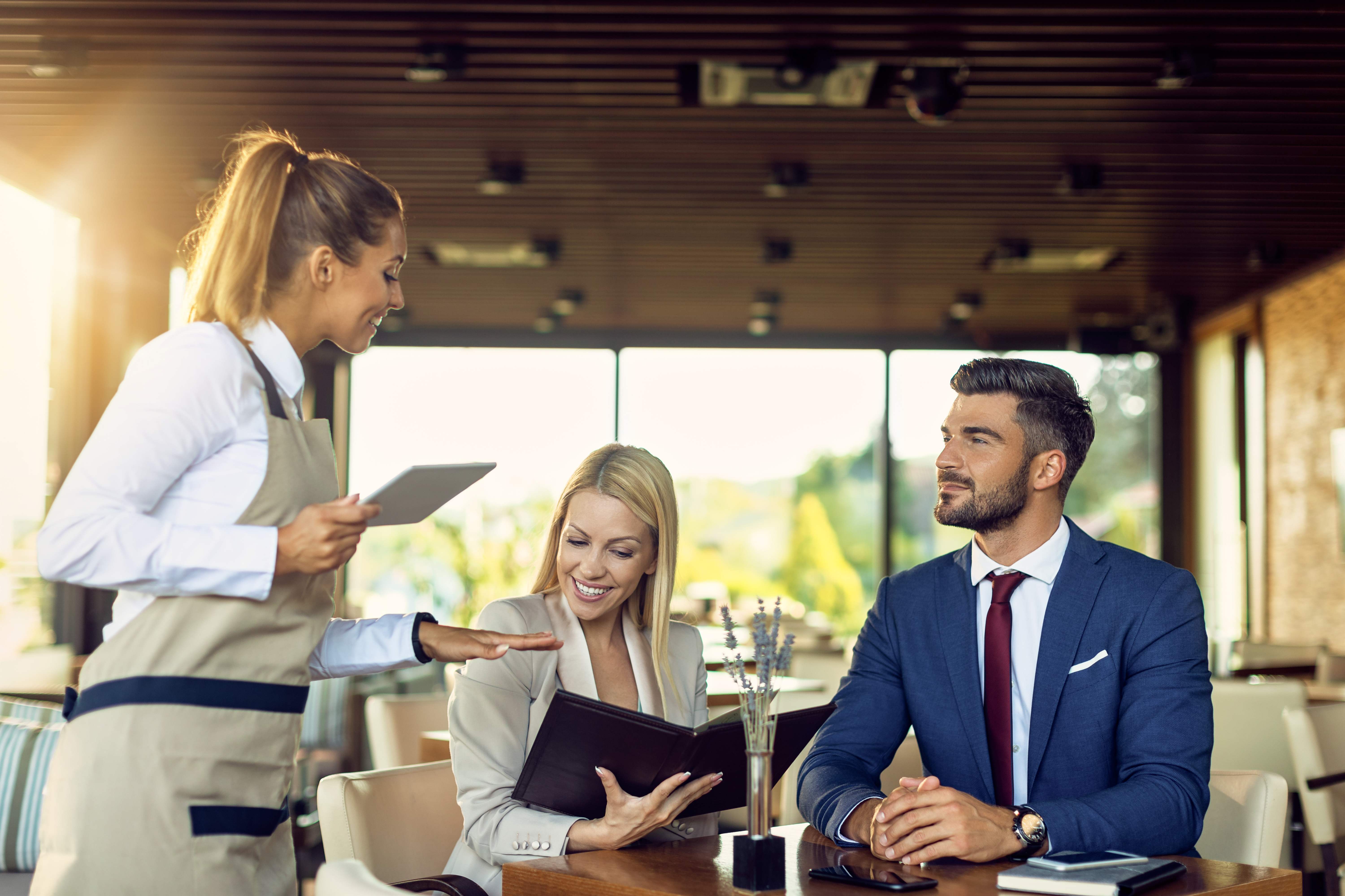 Hotel worker meeting with a staffing agency recruiter