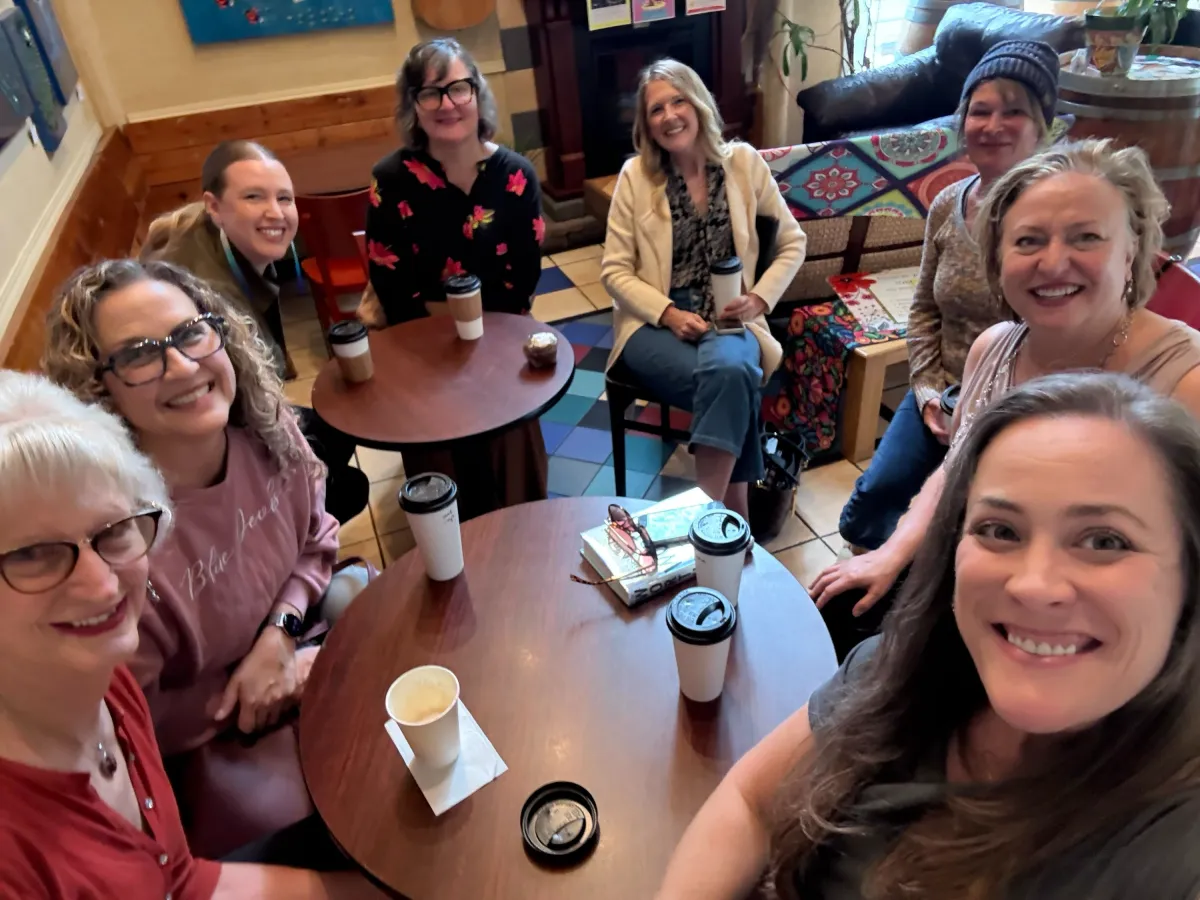 Women meeting and going over plans